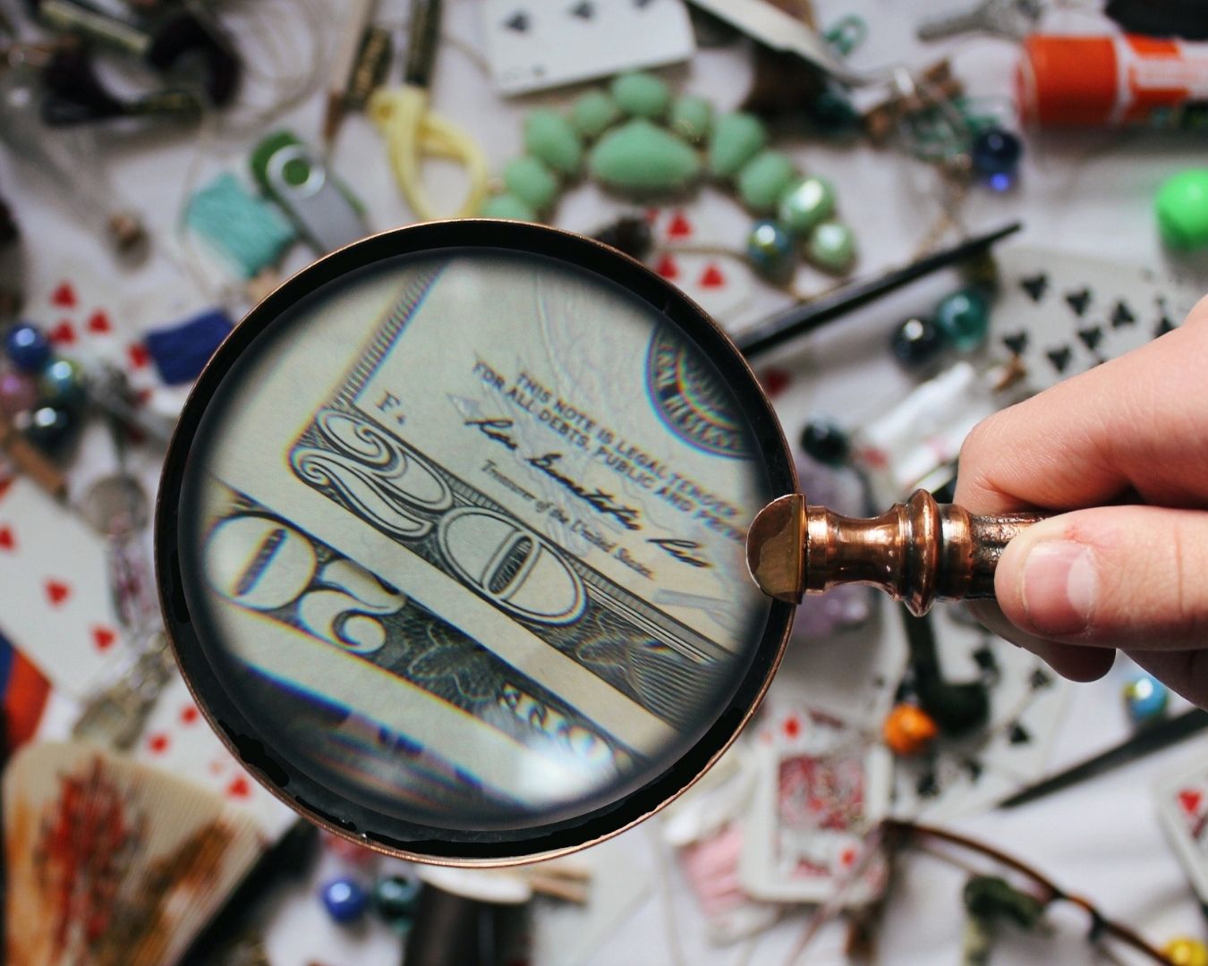 Network of digital icons over a laptop, representing technology in investigations.