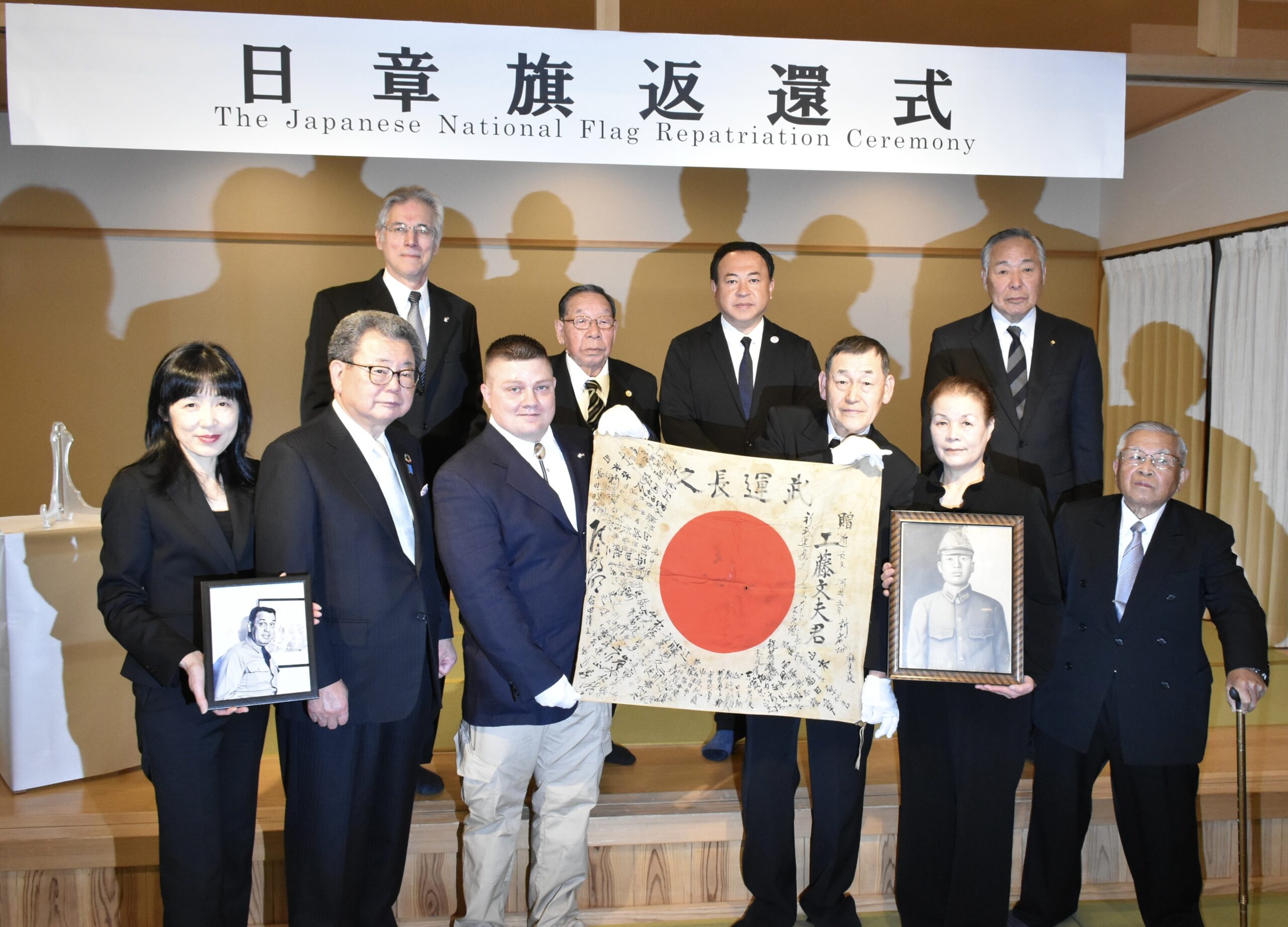 A group photo from The Japanese National Flag Repatriation Ceremony.