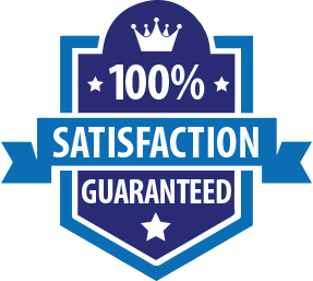 An overhead view of two people pointing at and reviewing a document on a table.